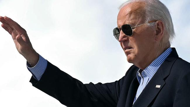 Mr Biden waves as he boards Air Force One. Picture: Saul Loeb/AFP