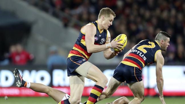 Reilly O'Brien gets the ball out of centre at first bounce of the game against the Giants resulting in the Crows first goal. Picture: Sarah Reed