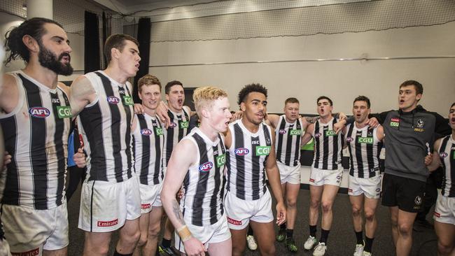 Debutants John Noble (left) and Isaac Quaynor celebrate Collingwood’s thrilling victory against West Coast in Perth on Friday night. Picture: AAP/Tony McDonough