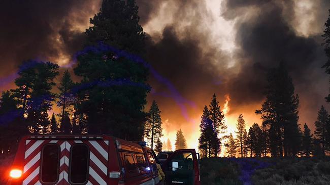 More than a million acres of the western US and Canada were in flames on July 14, 2021 as multiple blazes raged across the region.