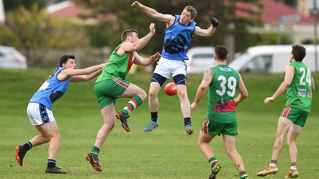 Mitchell Park and Flinders University clash in division seven earlier this season. Both of the struggling sides got wins to finish their campaigns. Picture: AAP/Mark Brake