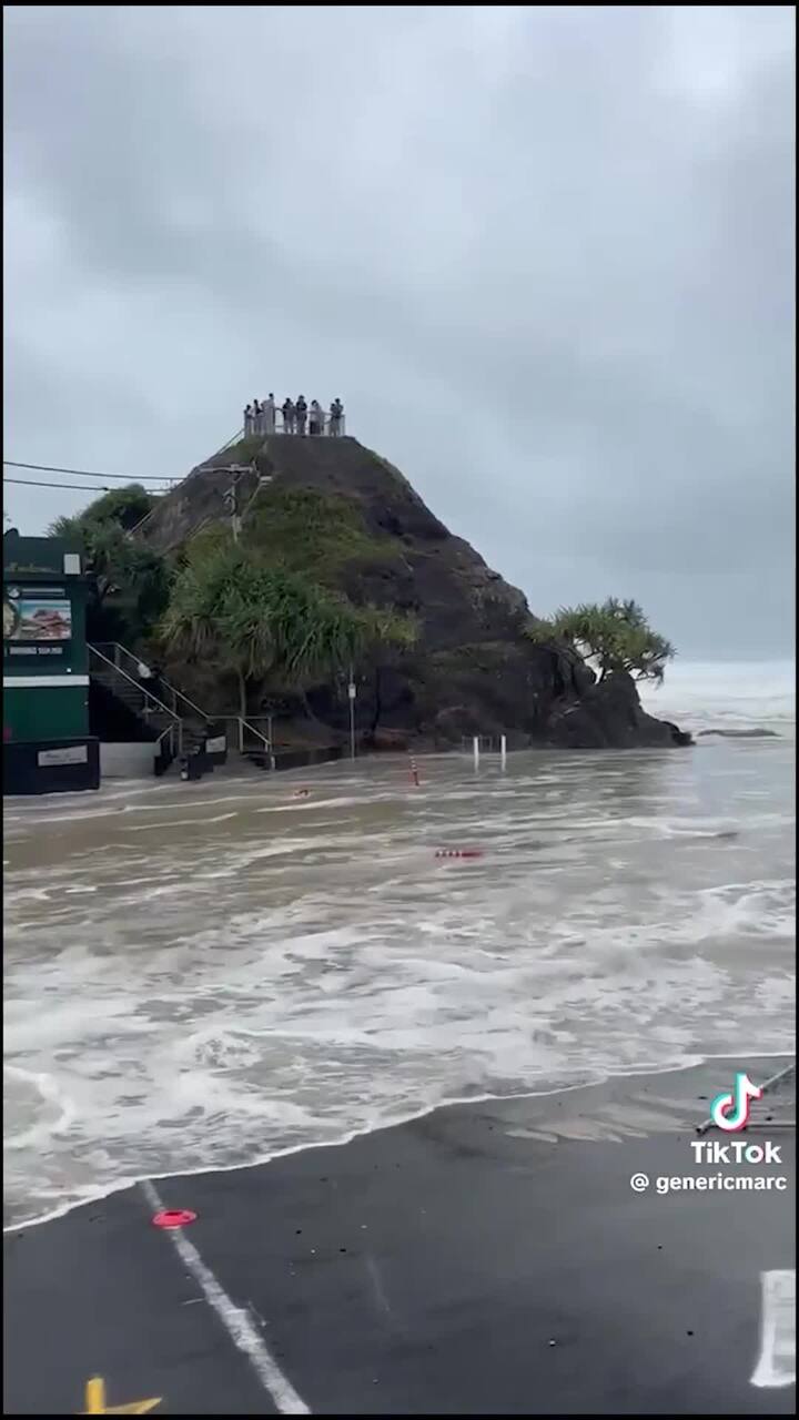 Sightseers trapped by storm surge at Currumbin