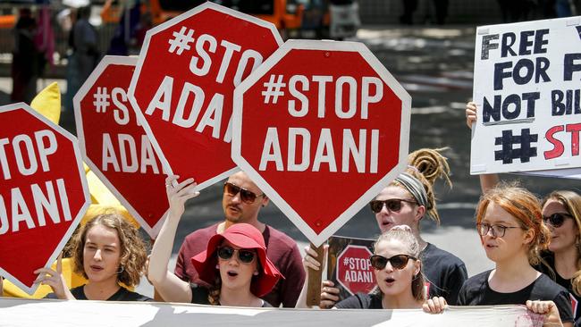 Anti Adani protesters are seen outside the Queensland Resources Council (QRC) Annual 'State of the Sector' Lunch earlier this week. Picture: AAP Image/Glenn Hunt