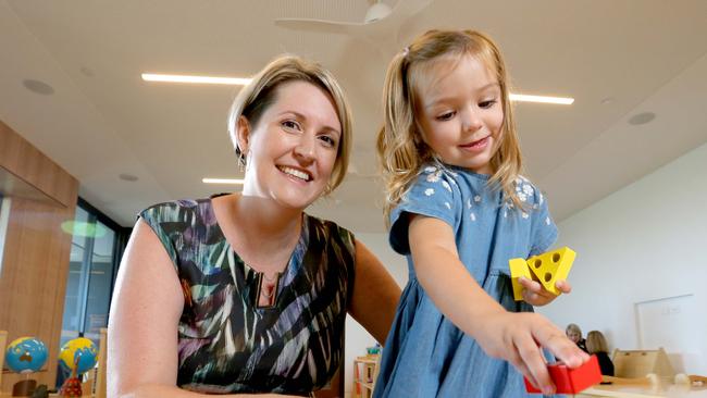 Joanne Sorley, the Consultant Psychologist with Dakota Devitt, 2, in the Montessori room doing block puzzles, at the new childcare centre is opening in Nundah, as parents demand more services from their centres. Picture: Steve Pohlner