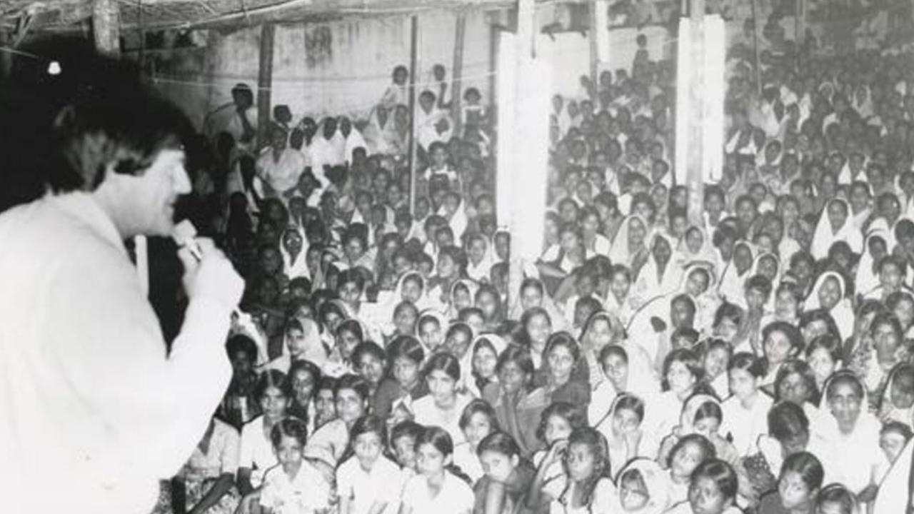 Clark Taylor speaks at an overseas rally.