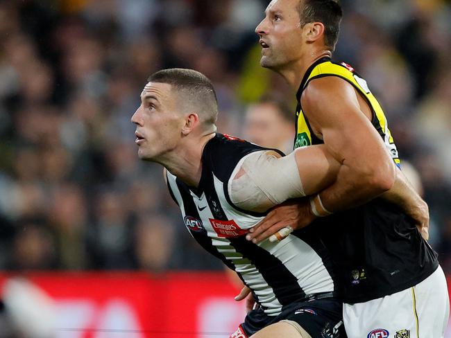 MELBOURNE, AUSTRALIA - MARCH 31: Darcy Cameron of the Magpies and Toby Nankervis of the Tigers compete in a ruck contest during the 2023 AFL Round 03 match between the Collingwood Magpies and the Richmond Tigers at the Melbourne Cricket Ground on March 31, 2023 in Melbourne, Australia. (Photo by Dylan Burns/AFL Photos via Getty Images)