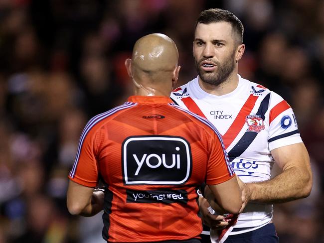 PENRITH, AUSTRALIA - SEPTEMBER 13: James Tedesco of the Roosters speaks to referee Ashley Klein during the NRL Qualifying Final match between Penrith Panthers and Sydney Roosters at BlueBet Stadium on September 13, 2024 in Penrith, Australia. (Photo by Cameron Spencer/Getty Images)