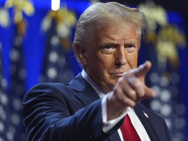 Republican presidential nominee former President Donald Trump arrives at an election night watch party at the Palm Beach Convention Center, Wednesday, Nov. 6, 2024, in West Palm Beach, Fla. (AP Photo/Evan Vucci)