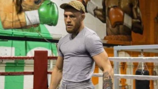 UFC star Conor McGregor poses.