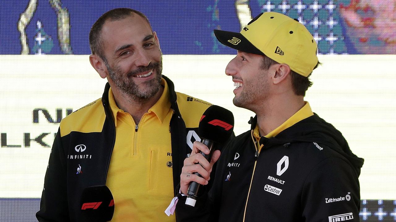 Renault team principal Cyril Abiteboul listens to driver Daniel Ricciardo at the 2019 Australian Grand Prix. Picture: AP