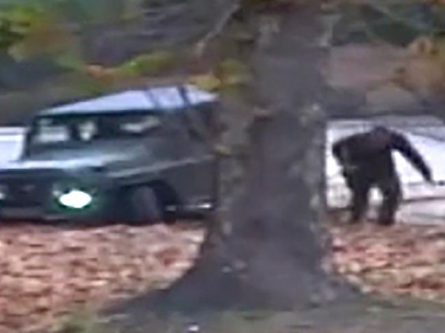 This screengrab made from video footage released by the United Nations Command on November 22, 2017 shows a North Korea defector running out from a vehicle at the Joint Security Area of the Demilitarized Zone (DMZ). Dramatic footage of a North Korean soldier's defection released on November 22 showed him racing across the border under fire from former comrades, and then being hauled to safety by South Korean troops. The defector, who ran across the border at the Panmunjom truce village on November 13, was shot at least four times and has been recovering in a South Korean hospital. / AFP PHOTO / UNITED NATIONS COMMAND / Handout / RESTRICTED TO EDITORIAL USE - MANDATORY CREDIT "AFP PHOTO / UNITED NATIONS COMMAND (UNC)" - NO MARKETING NO ADVERTISING CAMPAIGNS - DISTRIBUTED AS A SERVICE TO CLIENTS