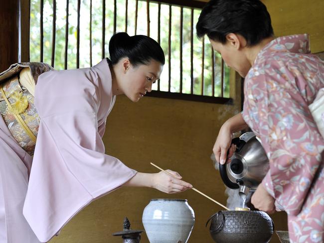 Wendy Lim and Irina Genken demonstrate a Japanese tea drinking ceremony, at Gosford Regional Gallery, Edogawa Commemorative Garden, East Gosford.