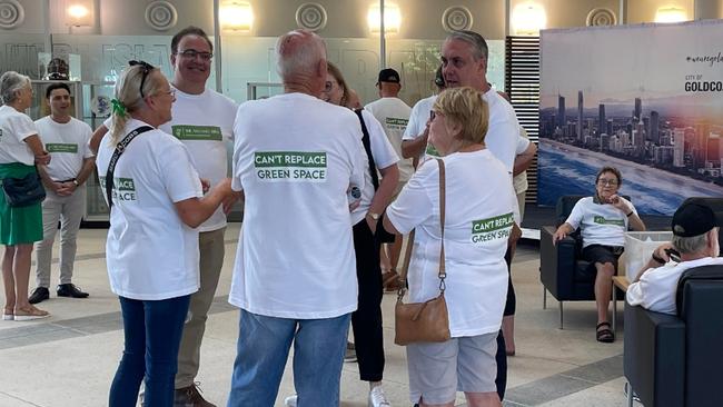 Residents arriving at the Gold Coast City Council protesting against residential development planned for the Arundel Country Club.