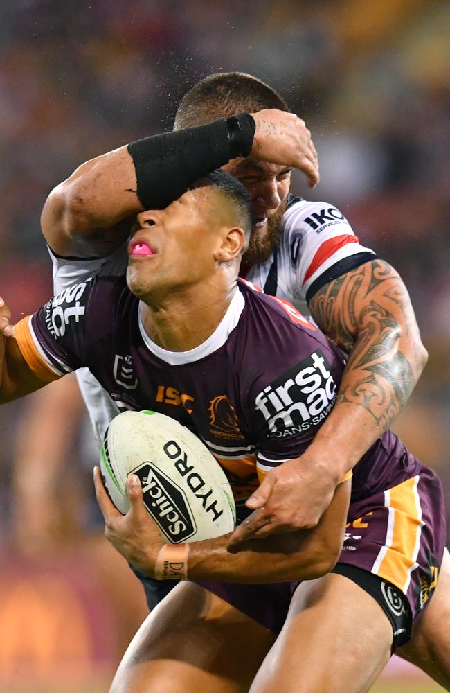 Jamayne Isaako cops a forearm from Jared Waerea-Hargreaves. Picture: AAP Image/Darren England