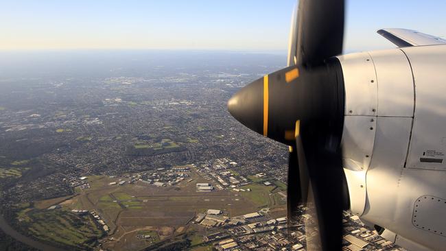 Generic photograph of Bankstown airport. Aircraft. Plane, flying, propeller sky, cloud