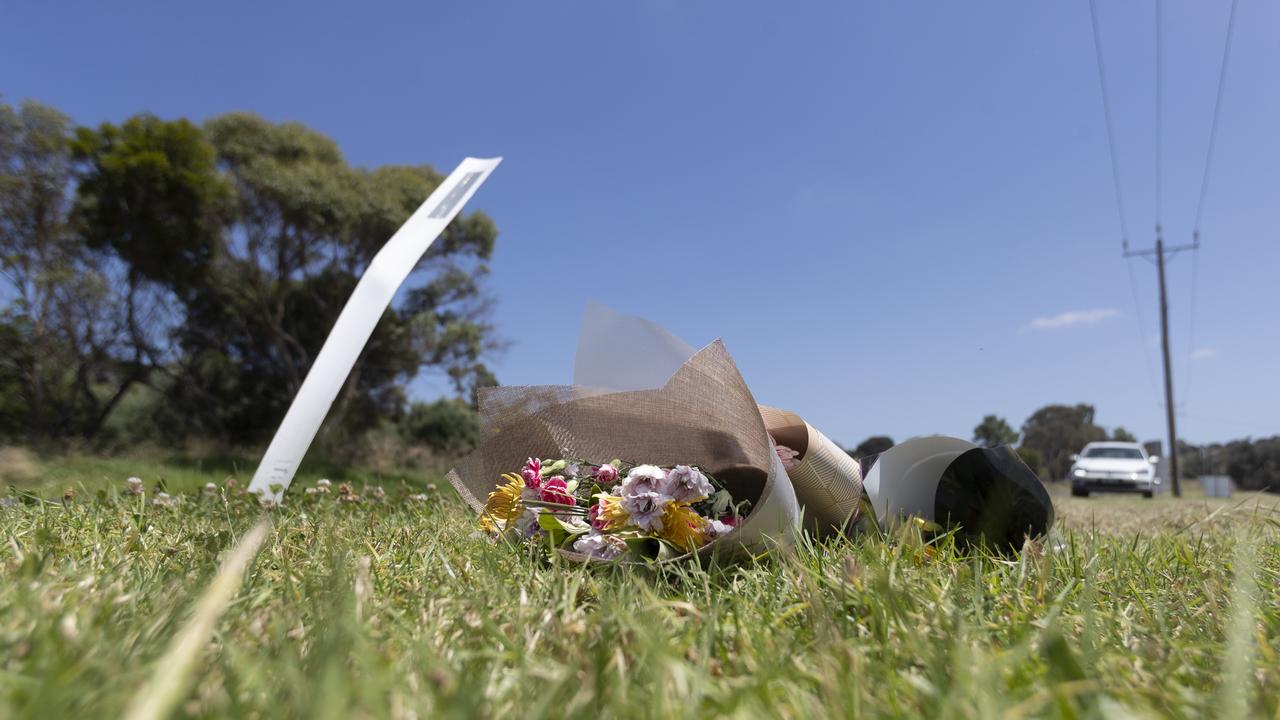 Flowers at the scene of Friday’s fatal crash in Portarlington. A minor crash happened less than 1km from the scene on Tuesday. Picture: Alan Barber