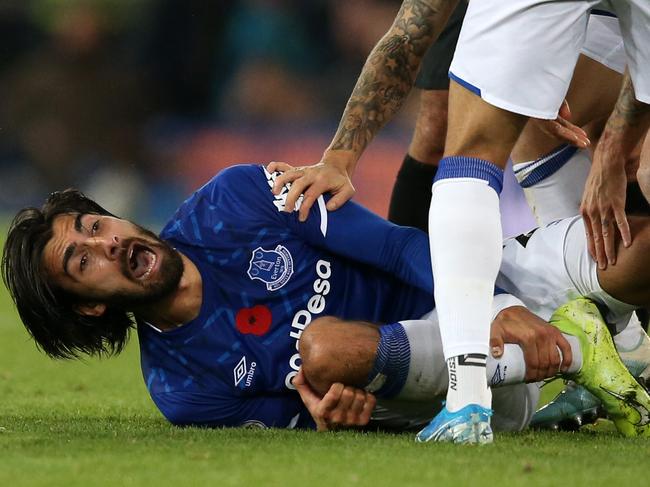 LIVERPOOL, ENGLAND - NOVEMBER 03: Andre Gomes of Everton reacts after being tackled by Son Heung-Min of Tottenham Hotspur during the Premier League match between Everton FC and Tottenham Hotspur at Goodison Park on November 03, 2019 in Liverpool, United Kingdom. (Photo by Jan Kruger/Getty Images)