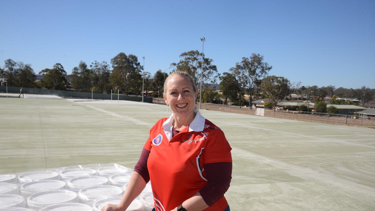 Linda Bunch in front of the new courts being constructed at Warwick Netball Association headquarters at Barnes Park.