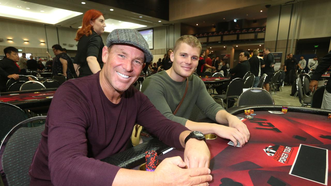 Shane Warne and his son Jackson playing in a poker tournament at Southport Sharks. Picture: Mike Batterham