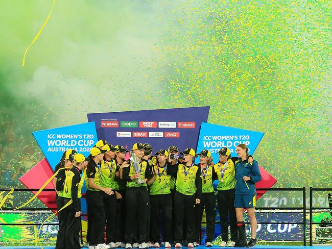 The Aussies are showered with streamers after their win. Picture: Mark Stewart.