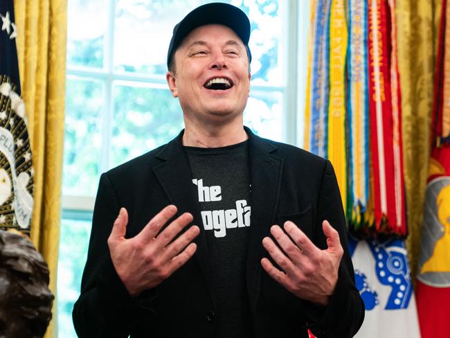 Elon Musk sported a black eye and a T-shirt emblazoned with the words ‘The Dogefather’ in the same font as the famous mafia film The Godfatther. Pictue: Allison Robbert / AFP