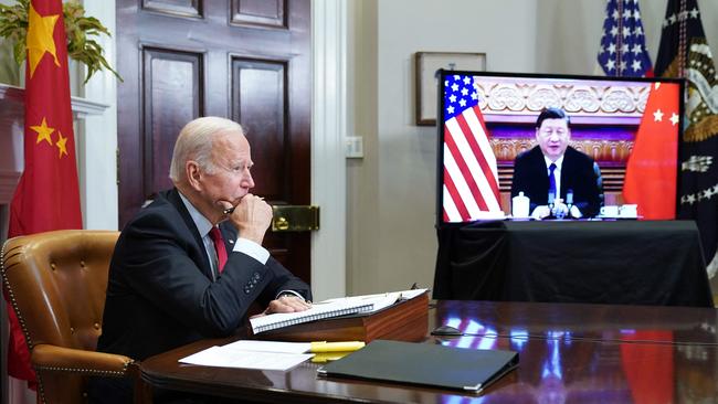 Biden time: Xi Jinping looks for a sabre to rattle during the virtual summit. Picture: AFP