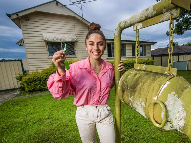 Alexis Iacovou, 25, who bought her first property - a three bedroom house in Woodridge - with the help of a guarantee from her parents.25-year-old Alexis Iacovou at her Woodridge property.Picture: Nigel Hallett