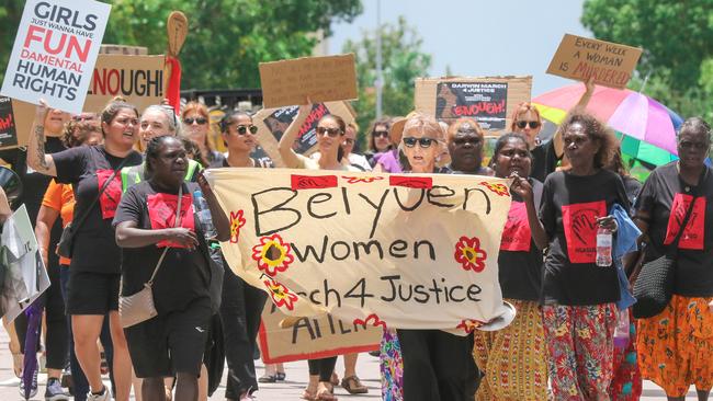 Darwin Women march down Bennett St towards Parliament House. Picture Glenn Campbell