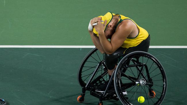 An emotional Dylan Alcott reacts to winning gold.