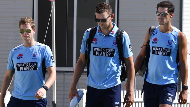 Steve Smith, left, with Australian teammates Josh Hazlewood and Mitchell Starc. 