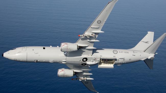 Air to Air photo of Royal Australian Air Force P-8A Poseidon with Harpoon Missiles.