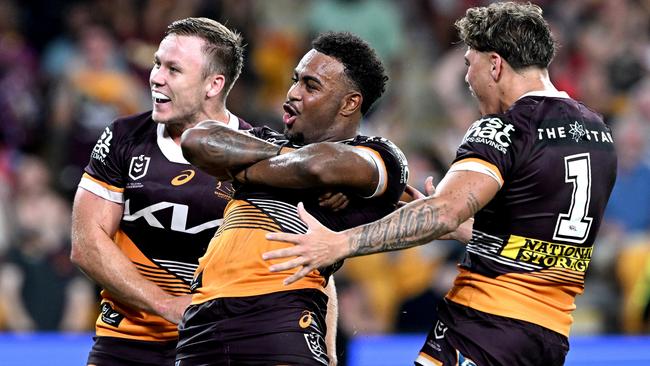 Brisbane Broncos Ezra Mam celebrates a try with teammates against St George Illawarra Dragons at Suncorp Stadium on March 18. Picture: Bradley Kanaris/Getty Images