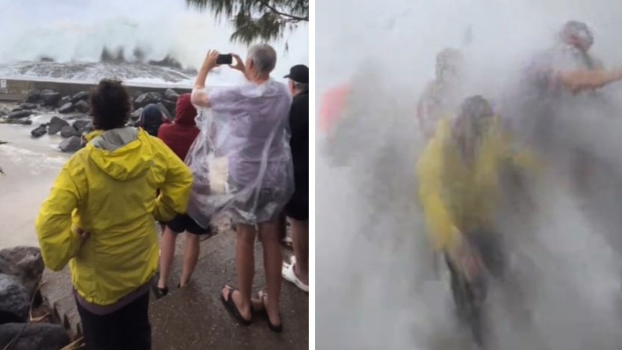 People checking out the storm surge on the Gold Coast got a surprise. Pictures: TikTok / @walitmichael