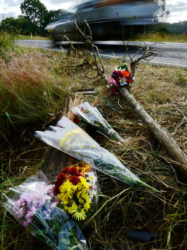 Flowers left at the scene of the crash site. Picture: David Nielsen / The Queensland Times