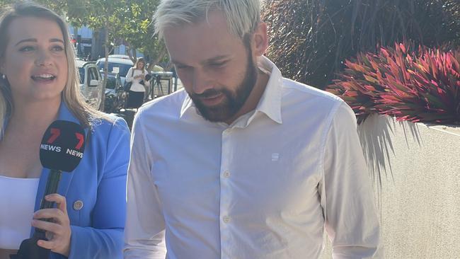 Troy Williams is asked questions by media as he leaves Southport Magistrates Court on June 28, 2022.