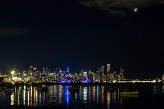 The 'Blood Moon' or lunar eclipse is seen from Williamstown in Melbourne. Picture: Darrian Traynor/Getty Images