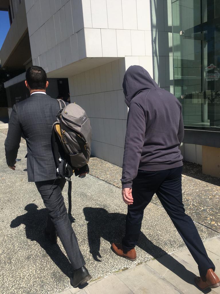 Justin Troy Owen leaves court after pleading guilty to child exploitation offences.