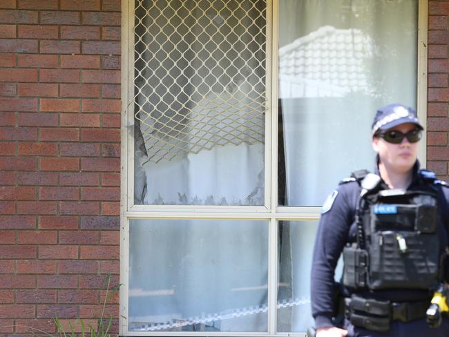 Police on scene at a Bix Court address at Crestmead where a man was shot by police. Picture: David Clark