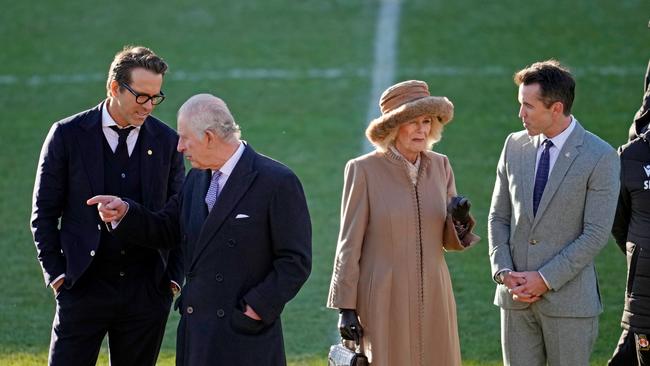 King Charles III and Camilla talk to owners of Wrexham AFC Ryan Reynolds Rob McElhenney. Picture: AFP