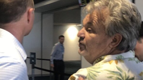 Peter Foster leaves Cairns airport after being arrested over the weekend. Picture: Twitter