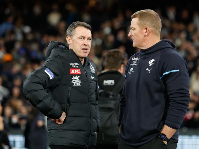 MELBOURNE, AUSTRALIA - MAY 03: Craig McRae, Senior Coach of the Magpies and Michael Voss, Senior Coach of the Blues are seen after the 2024 AFL Round 08 match between the Carlton Blues and the Collingwood Magpies at The Melbourne Cricket Ground on May 03, 2024 in Melbourne, Australia. (Photo by Dylan Burns/AFL Photos via Getty Images)