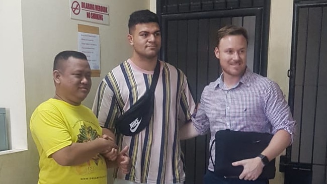 "NEWS360 PREMIUM LOCKED CONTENT: NO NEWS.COM, NO SKYNEWS, NO WEST AUSTRALIAN, NO AUSTRALIAN" Brisbane Broncos David Fifita (C) shake hand with the victim Dani Irawan (L) and Broncos Manager Adam Walsh inside Kuta Police Station after signing the peaceful agreement. Fifita was arrested on allegedly assault Dani Irawan the security guard at La Favela nightclub in Seminyak, Kuta, Bali. (Picture. Supplied)