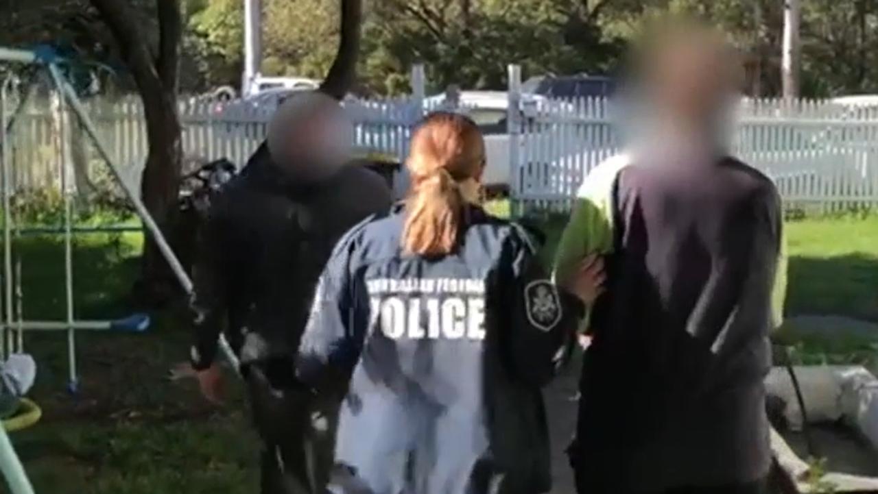 Australian Federal Police (AFP) arrest a Hunter man over child abuse material charges. Picture: AFP