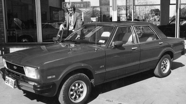 Footballer Graham Cornes with a new six-cylinder Ford Cortina in 1977. Picture: News Corp Australia