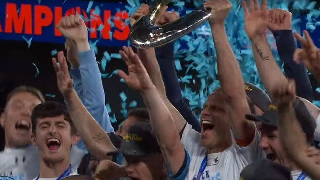 Sydney FC celebrate winning the title.