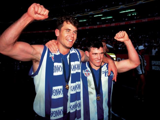 Wayne Carey and Anthony Stevens celebrating the 1996 premiership. AFL Photos/GSP.