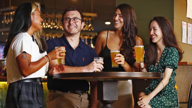 The government is set to reduce the price of draught beer. Drinkers at the Commodore Hotel (L-R) Maureen Sue, Matthew Trevitt, Geena Values and Amy Chang. Picture: Sam Ruttyn