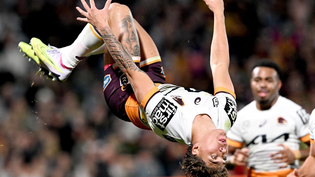 Walsh stuns with an impressive backflip after scoring a try, only to spew straight after. Picture: Getty Images.