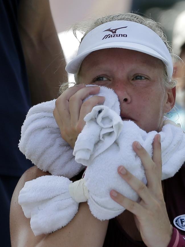 Kiki Bertens, of the Netherlands, wraps an ice towel around her neck during a changeover in her match against Kristyna Pliskova. Picture: AP Photo