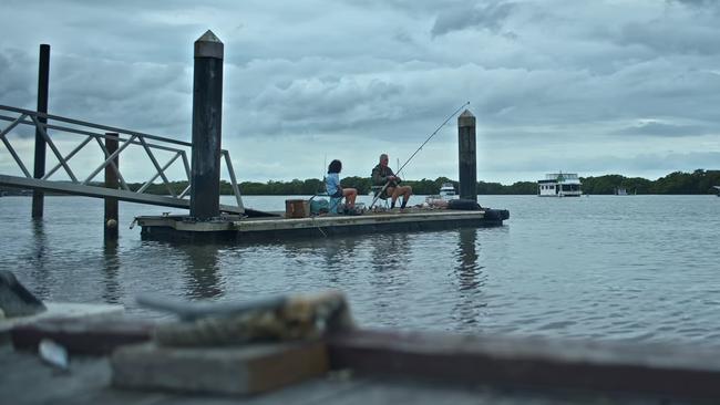 Slim Halliday and Eli fishing at Jacobs Well. Picture: Netflix.